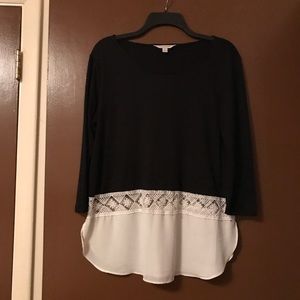 Black top with with white shear at bottom